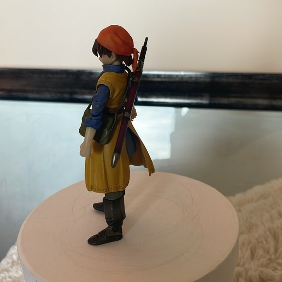Adventure Figure with Yellow Coat and Red Hat - Picture 3 of 5